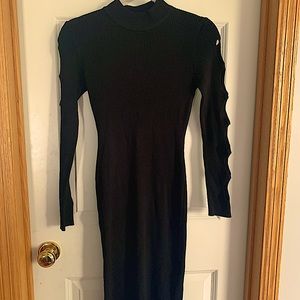 Black Knee length long sleeve body con dress by Crave Fame. Size is medium